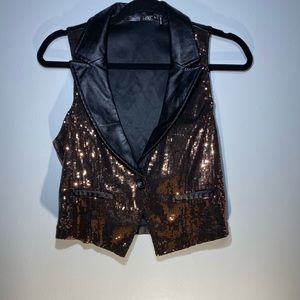 Have sequin leather vest. large women’s